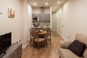 Kuchyňa alebo kuchynka v ubytovaní SEVITUR Seville Comfort Apartments