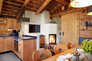 Kuchyň nebo kuchyňský kout v ubytování Promi Alm Flachau - Luxus Chalets