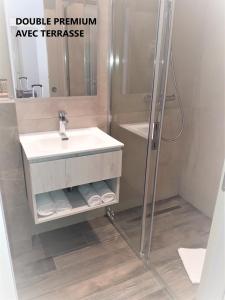 Salle de bains dans l'établissement Hôtel restaurant Oasis