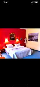 Letto o letti in una camera di Parkhotel