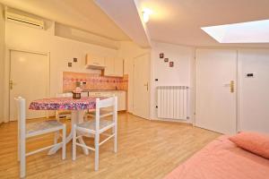 Kuchyň nebo kuchyňský kout v ubytování Apartments Udovicic HH