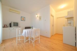 Kuchyň nebo kuchyňský kout v ubytování Apartments Udovicic HH