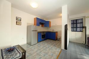 Kuchyň nebo kuchyňský kout v ubytování Apartments Udovicic HH