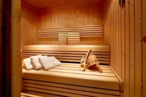 Postel nebo postele na pokoji v ubytování Promi Alm Flachau - Luxus Chalets