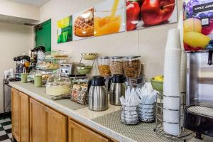 a kitchen counter with various food items on it at Quality Inn in Culpeper