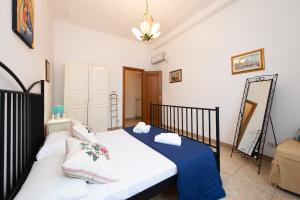 A bed or beds in a room at Fornaci Deluxe San Pietro