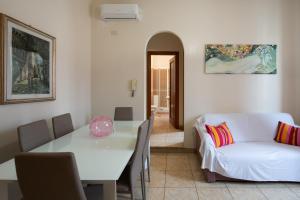 A bed or beds in a room at Fornaci Deluxe San Pietro
