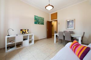 A bed or beds in a room at Fornaci Deluxe San Pietro