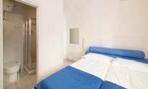 Postel nebo postele na pokoji v ubytování 2 Be Home Colosseo