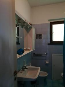 Phòng tắm tại Appartamento Conca dei Rododendri