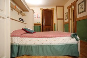 Postel nebo postele na pokoji v ubytování Hotel Della Nouva