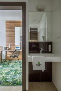 Kuchyň nebo kuchyňský kout v ubytování Bloom Hotel Airport Okęcie