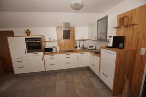 Kuchyň nebo kuchyňský kout v ubytování Ferienwohnung Steiner Gertrude