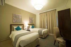 Ліжко або ліжка в номері Tulip Inn Corniche Dammam