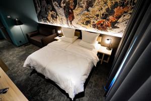 Postel nebo postele na pokoji v ubytování Hotel Viktorosa