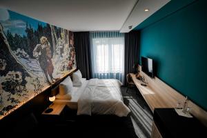 TV a/nebo společenská místnost v ubytování Hotel Viktorosa