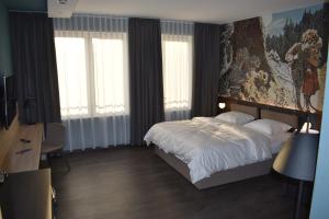 Postel nebo postele na pokoji v ubytování Hotel Viktorosa