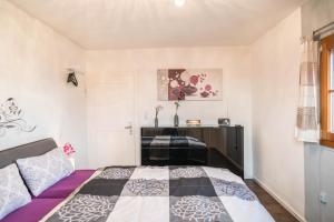Postel nebo postele na pokoji v ubytování Ferienwohnung Kirchblick