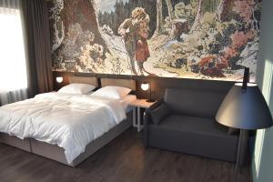 Postel nebo postele na pokoji v ubytování Hotel Viktorosa