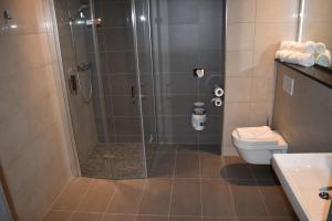 Koupelna v ubytování Hotel Viktorosa