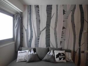 A bed or beds in a room at Bilocale con cucina a 300 m dalle piste