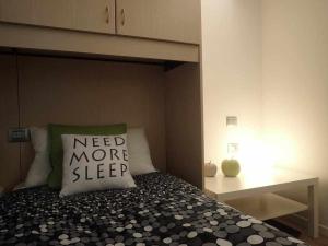 A bed or beds in a room at Bilocale con cucina a 300 m dalle piste