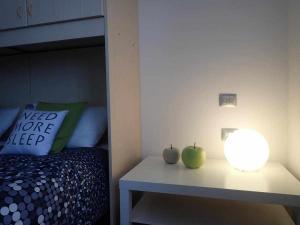 A bed or beds in a room at Bilocale con cucina a 300 m dalle piste