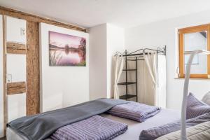 Postel nebo postele na pokoji v ubytování Ferienwohnung Säntisblick