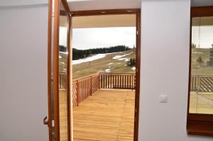 Balkón alebo terasa v ubytovaní Panorama Donovaly 22-C