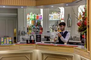 Nápoje v ubytování Norfolk Royale Hotel