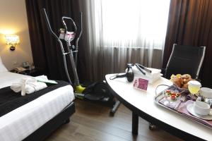 Uma cama ou camas num quarto em Holiday Inn Genoa City by IHG