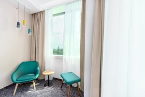 Posezení v ubytování Clarion Hotel Vienna South