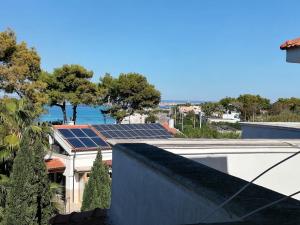 a group of solar panels on the roof of a building at Alloggi Estivi D & A in Taranto