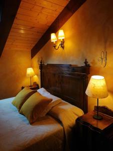 
A bed or beds in a room at Castello San Giuseppe - Historical bed and breakfast
