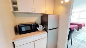 A kitchen or kitchenette at Castle 1733 Ocean view studio with direct beach access, pool, tennis & free parking