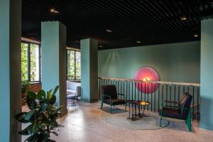 a waiting room with two chairs and a table at Holiday Inn Telavi by IHG in Telavi