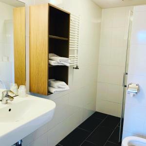 Ein Badezimmer in der Unterkunft Prinsengracht Hotel