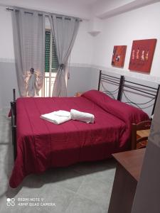 Postel nebo postele na pokoji v ubytování Hotel Alloggio Del Conte