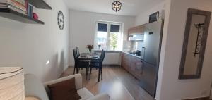 Kuchyňa alebo kuchynka v ubytovaní A&S Apartments - WIDOK + 15 fotografií