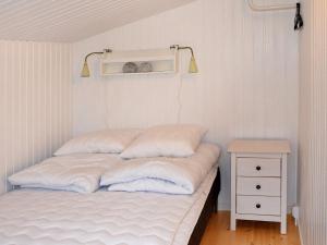 Postel nebo postele na pokoji v ubytování Holiday home Idestrup VIII
