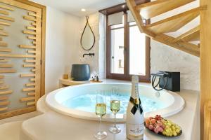 Nápoje v ubytovaní Vista Del Porto Luxury Suites