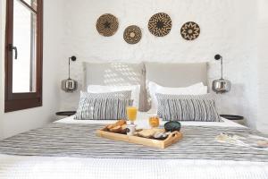 Posteľ alebo postele v izbe v ubytovaní Vista Del Porto Luxury Suites
