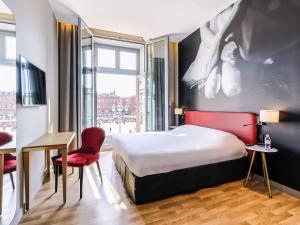 Un ou plusieurs lits dans un hébergement de l'établissement Ibis Styles Toulouse Capitole