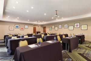 a conference room with tables and chairs in it at Holiday Inn Express Hotel & Suites Lavonia by IHG in Lavonia +41 photos
