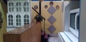 Hostal Tunquelen的厨房或小厨房