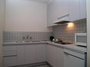 Kuchyň nebo kuchyňský kout v ubytování Nunawading Motor Inn