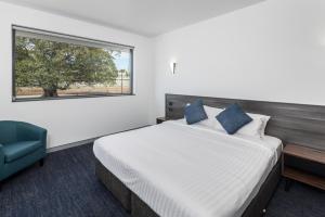 Thornton Executive Hotel客房内的一张或多张床位