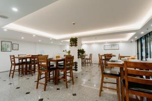 מסעדה או מקום אחר לאכול בו ב-Marigold Hotel Hanoi
