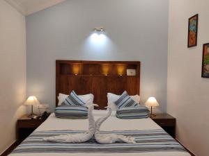 Uma cama ou camas num quarto em Santana Beach Resort