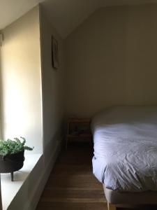 Postel nebo postele na pokoji v ubytování Maisons de Vignerons